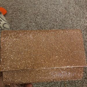 Rose gold aldo clutch